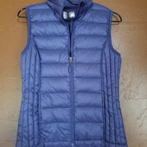 Small dark blue puffer vest